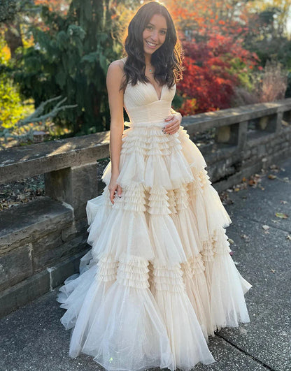 layered prom dress with sweep train