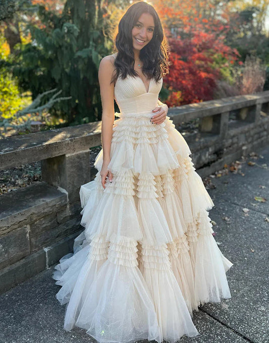 layered prom dress with sweep train